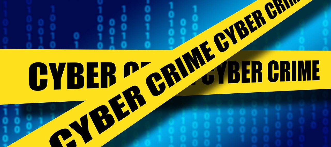 Cybersecurity, cybercrime, police tape, computers